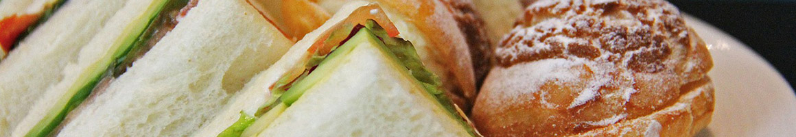 Eating Sandwich at Planet Sub restaurant in Overland Park, KS.